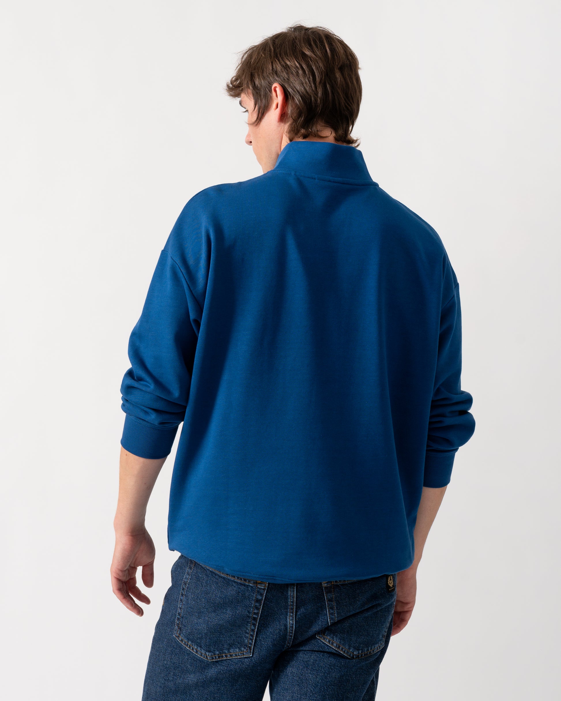 back of a HUGO Durty244 Mens 1/4 Zip Sweatshirt in Open Blue 498