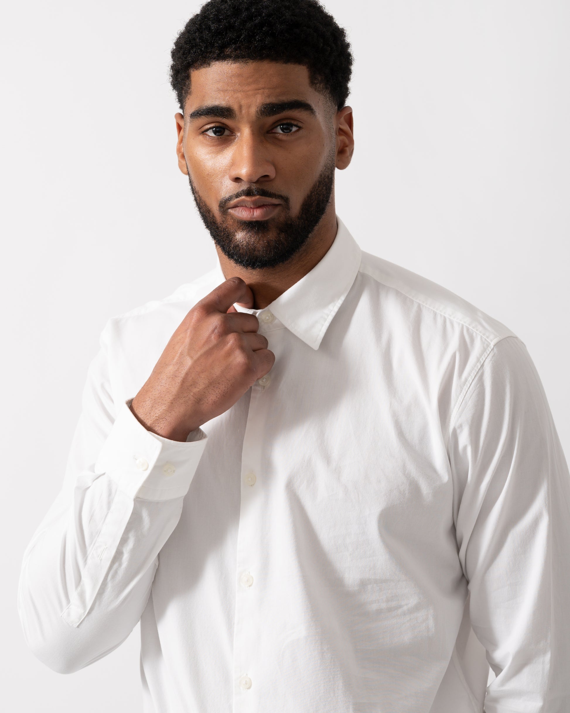 detail shot of a Model wearing HUGO Ermo Mens Slim-Fit Shirt in Stretch-Cotton Canvas in Open White