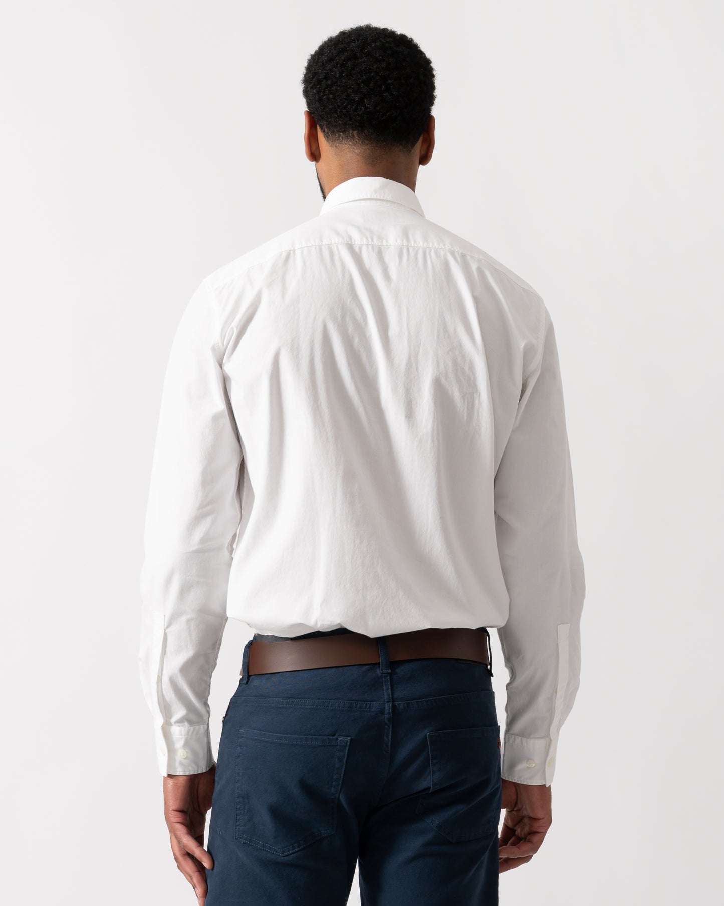 back shot of a Model wearing HUGO Ermo Mens Slim-Fit Shirt in Stretch-Cotton Canvas in Open White