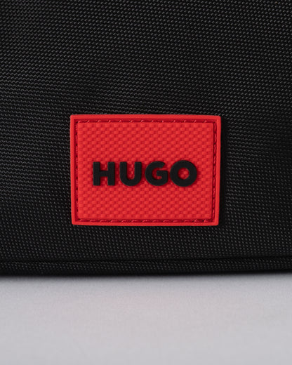 logo detail of a HUGO Ethon 3.0 Mens Crossbody Bag in Black