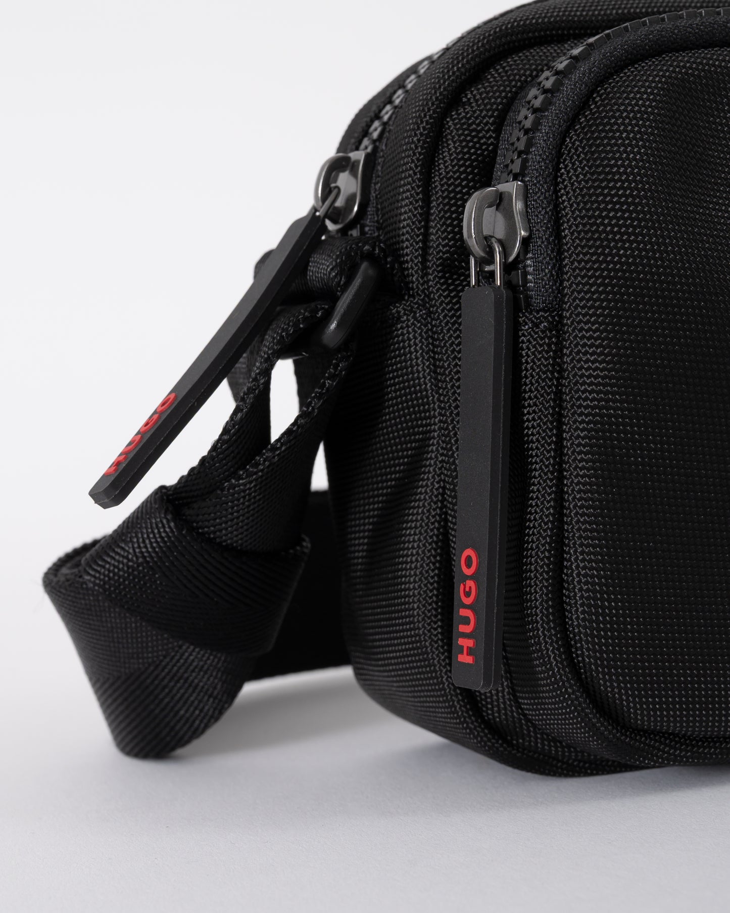 zipper pull detail shot of a HUGO Ethon 3.0 Mens Crossbody Bag in Black
