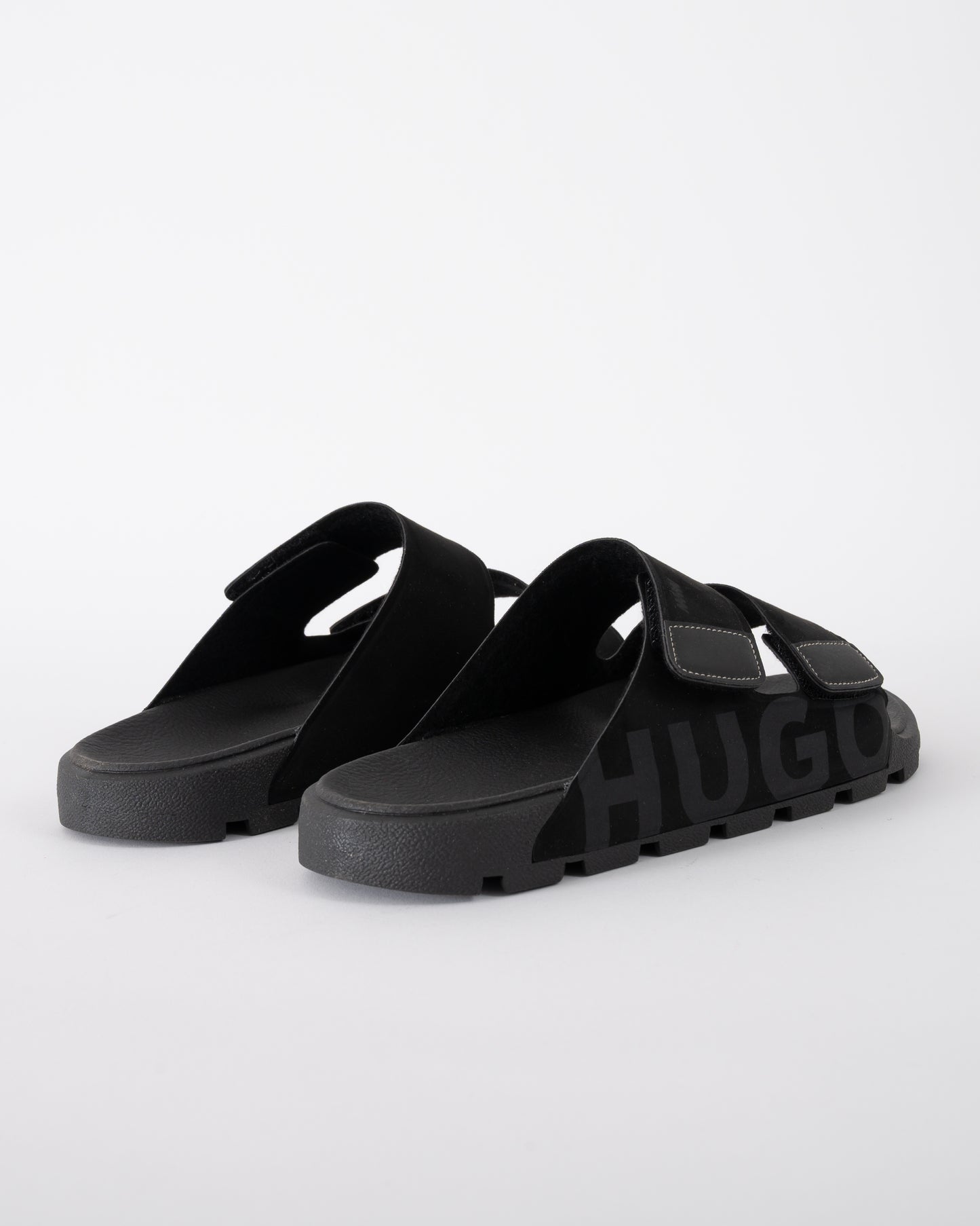 back shot of HUGO Evander Mens Faux-Suede lides with Logo Detailing in Black