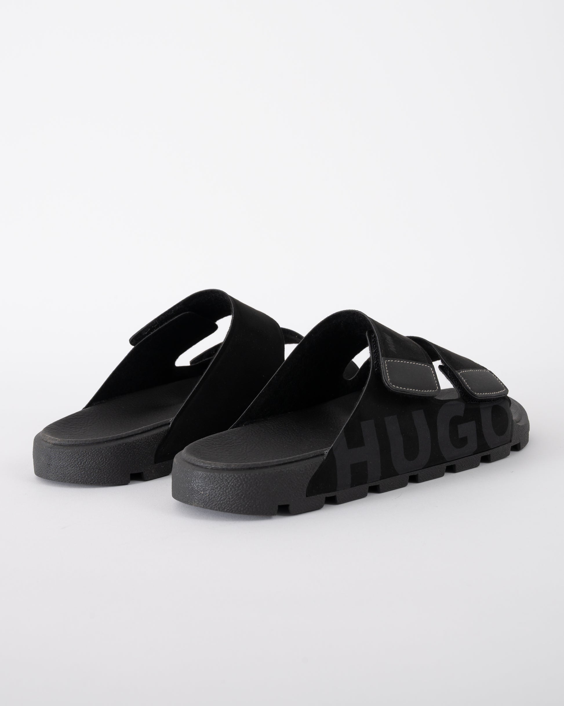 back shot of HUGO Evander Mens Faux-Suede lides with Logo Detailing in Black