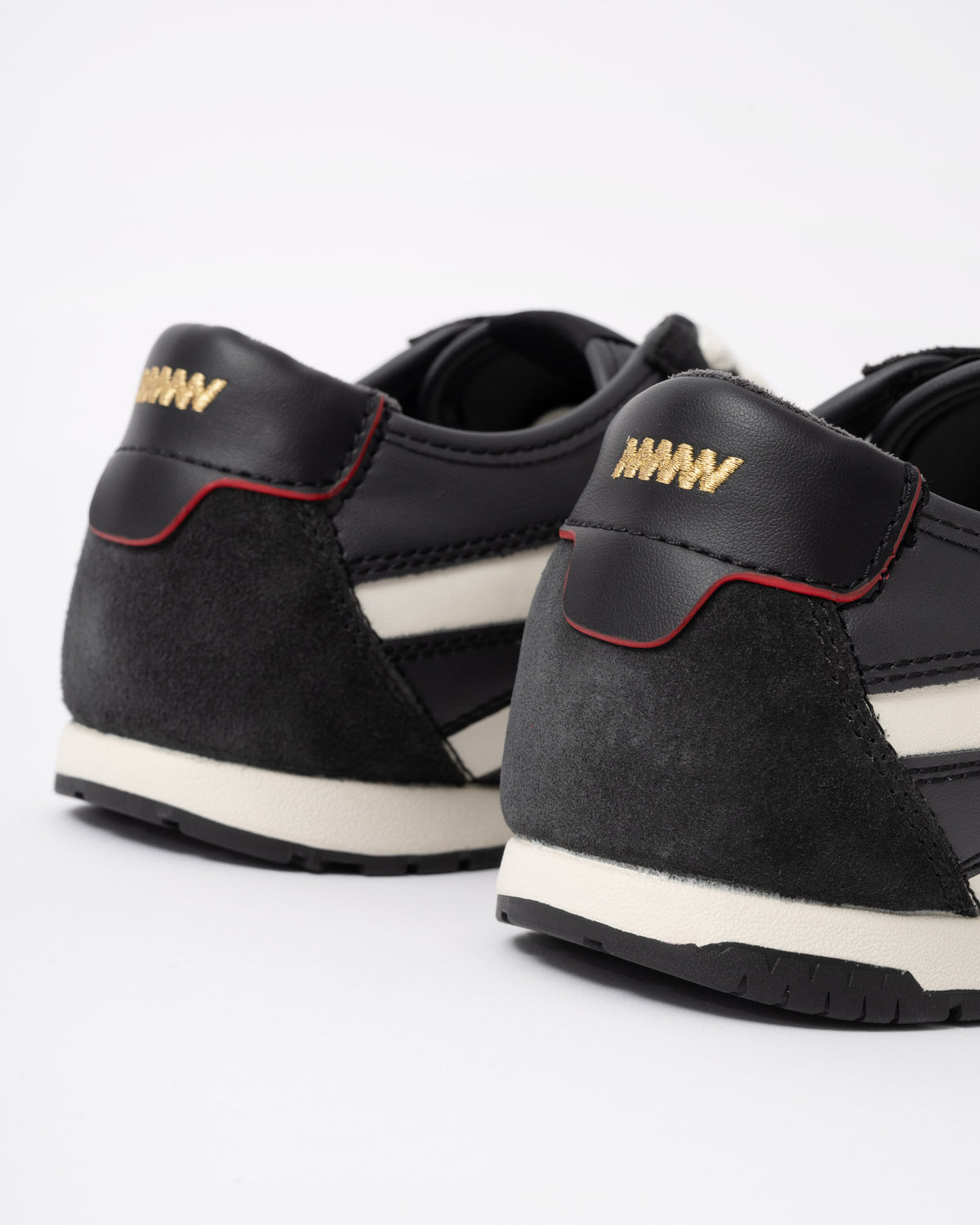 Heel detail on the HUGO Lytton Mens Suede-Panelled Trainers with a Retro Silhouette - Black 001