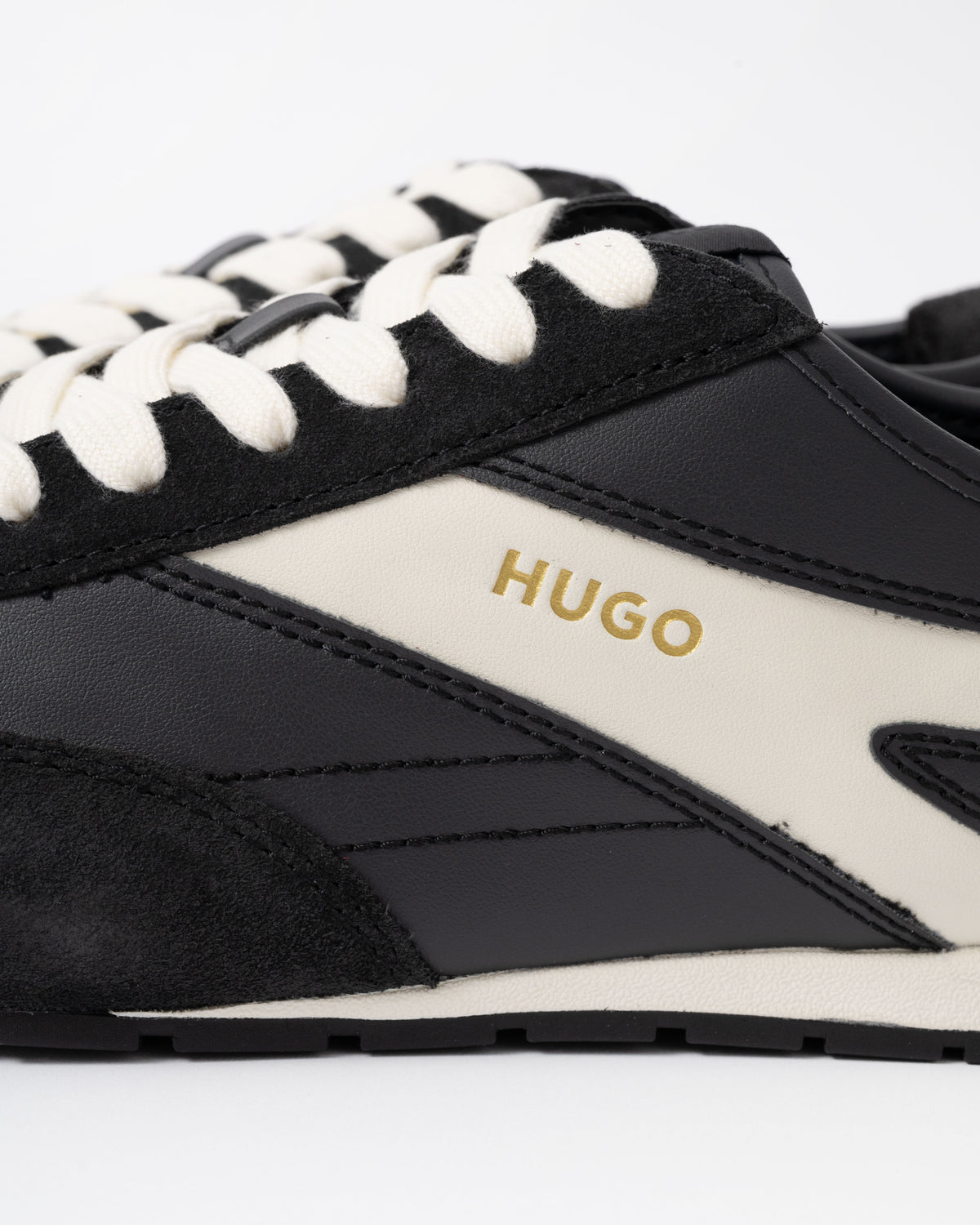 HUGO logo on the HUGO Lytton Mens Suede-Panelled Trainers with a Retro Silhouette - Black 001