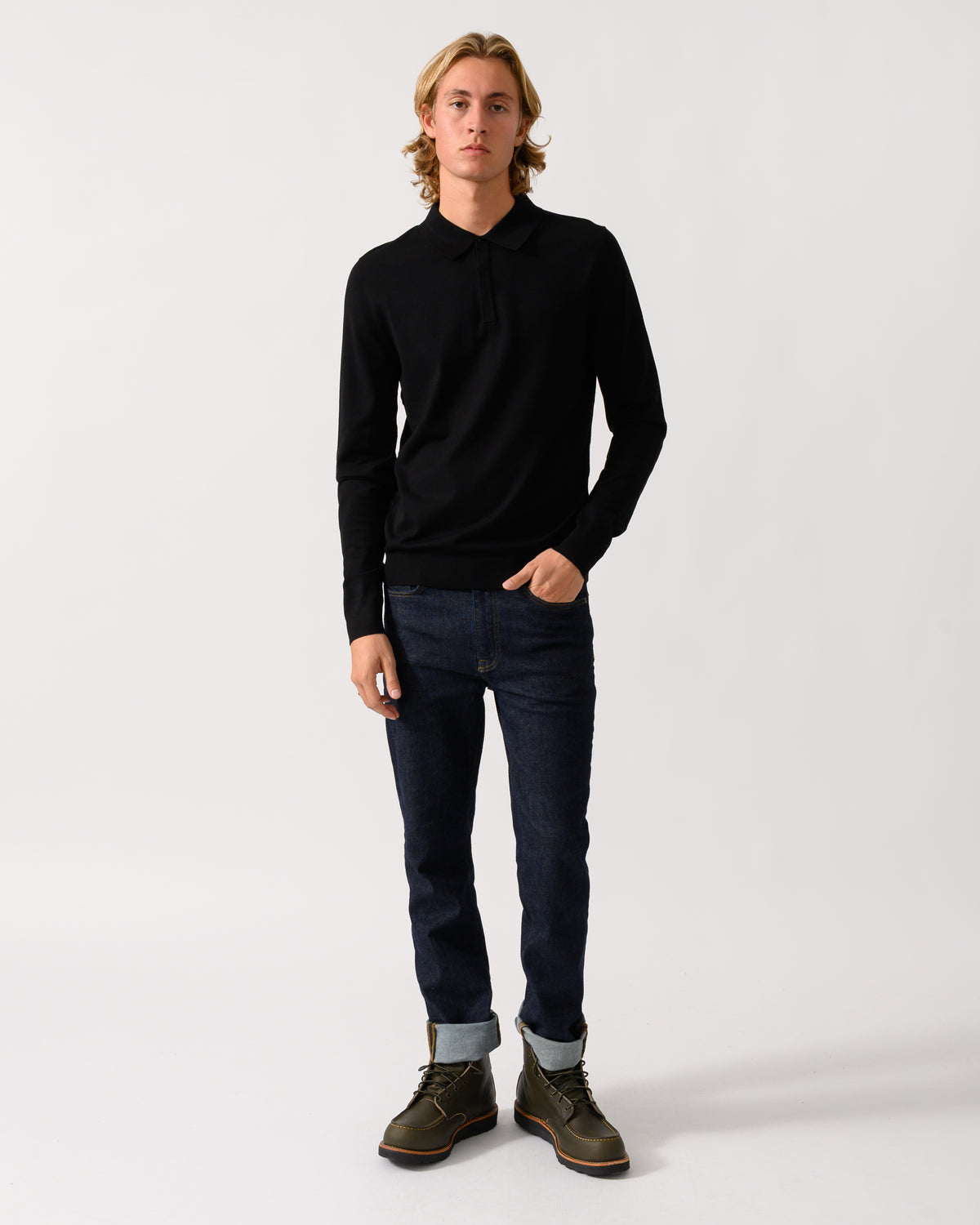 full length of a model wearing a HUGO San Pippo Mens Slim-fit knit polo with rear logo in Black 001