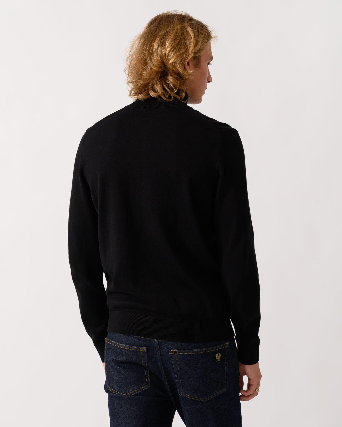 back of a model wearing a HUGO San Quintus-C2 Mens 1/4 Zip Funnel Neck Jumper in Black 001