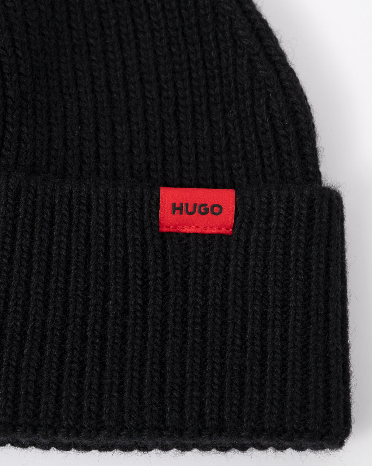 logo detail of a HUGO Xisk Mens Beanie in Black 001
