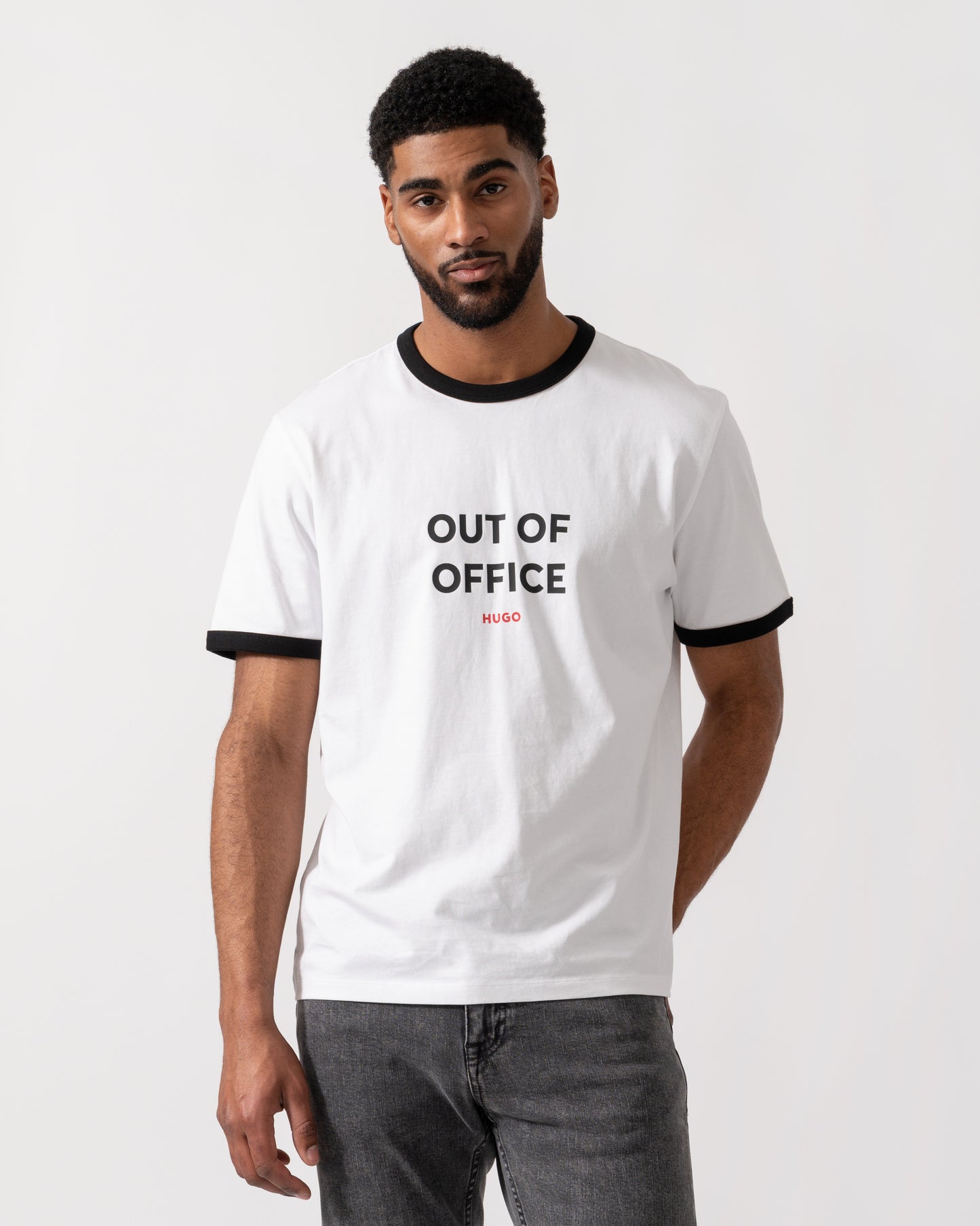 Model wearing HUGO Out-Of-Office T-Shirt in White 100 - Main