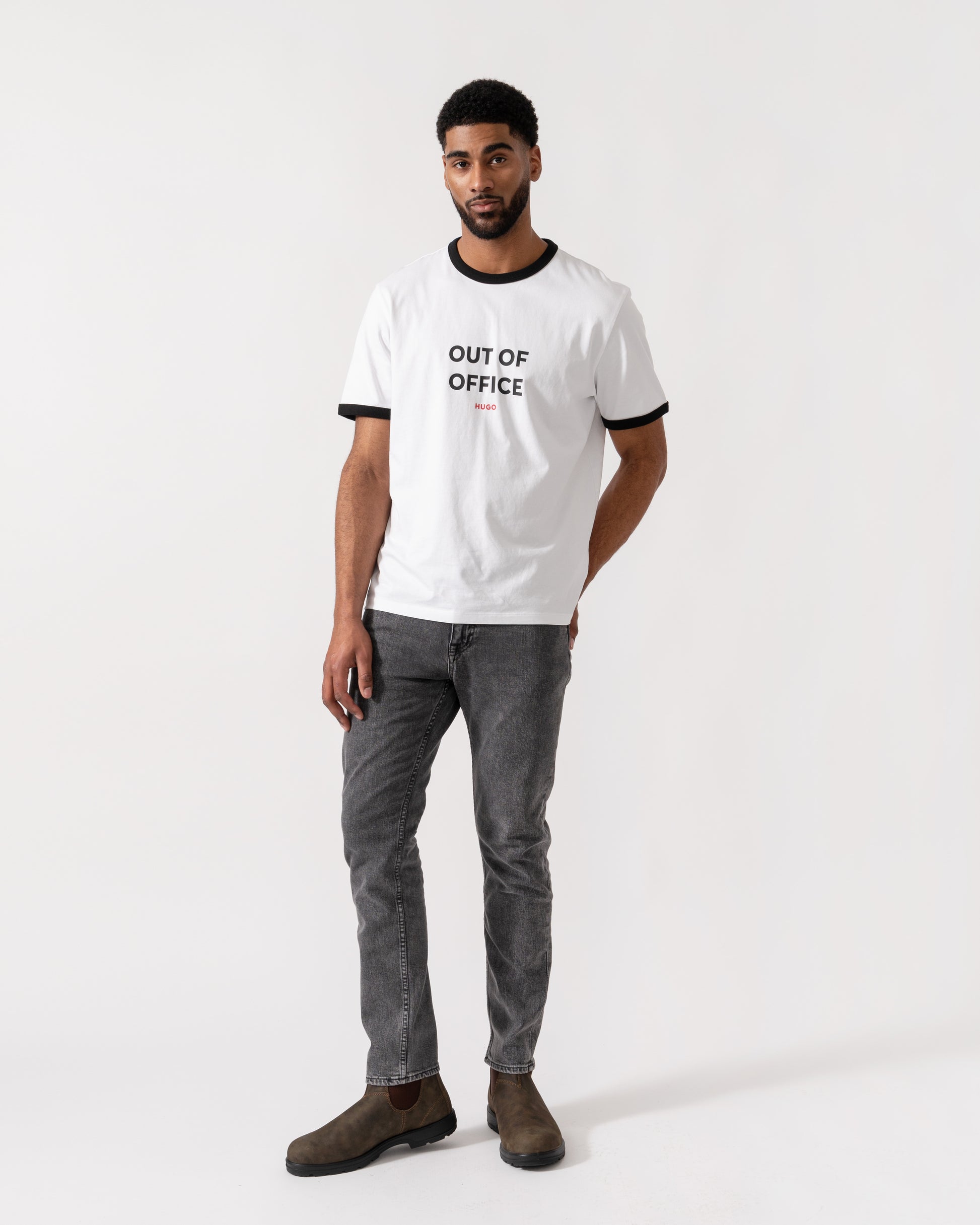Model wearing HUGO Out-Of-Office T-Shirt in White 100 - full length