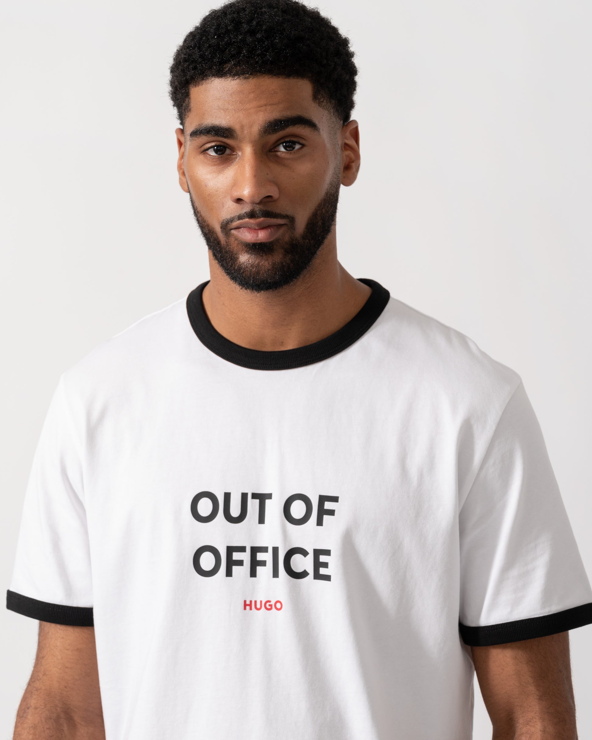 Model wearing HUGO Out-Of-Office T-Shirt in White 100 - detail