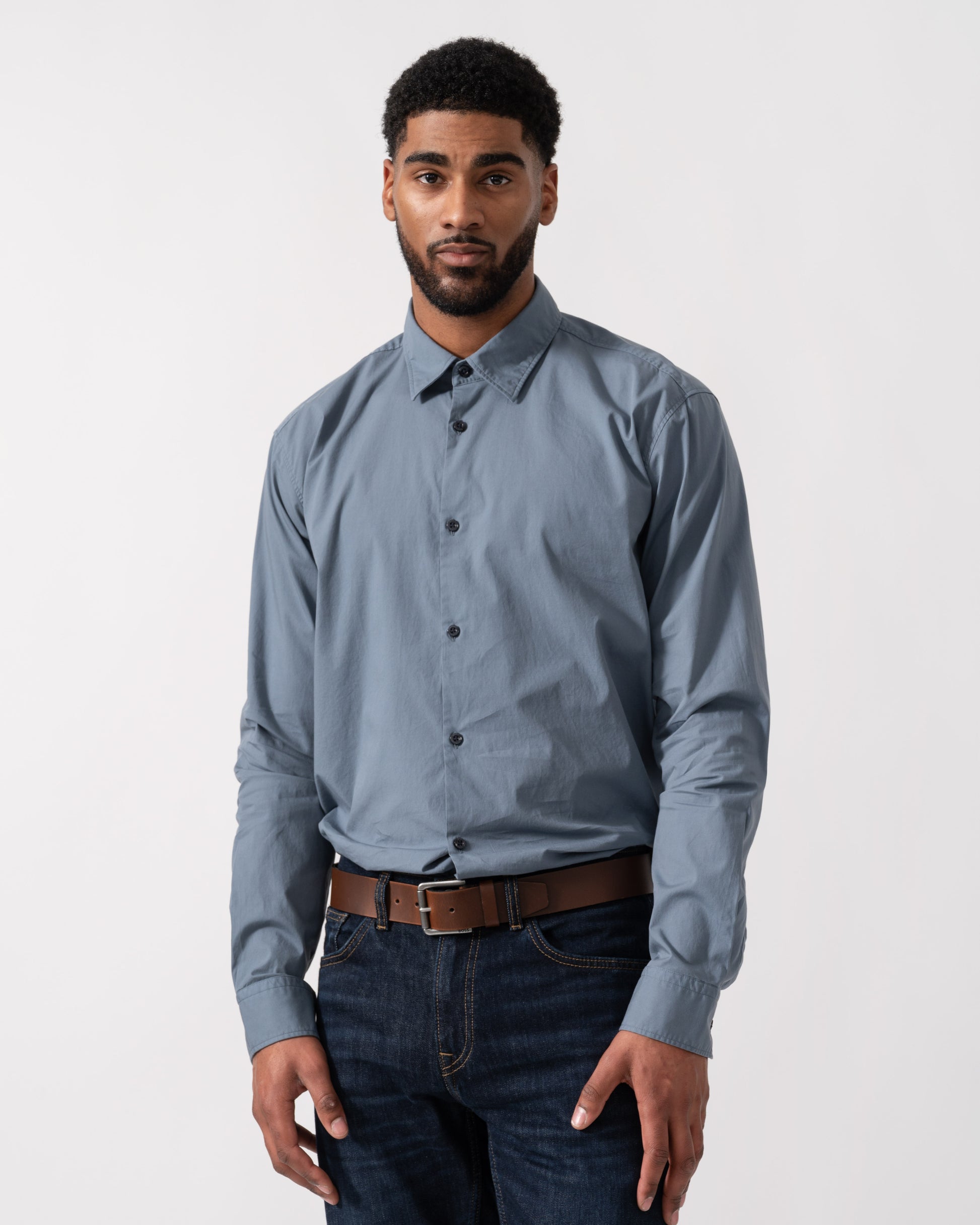 Model wearing HUGO Ermo Slim-Fit Shirt in Stretch-Cotton Canvas in Open Blue 496 -Main