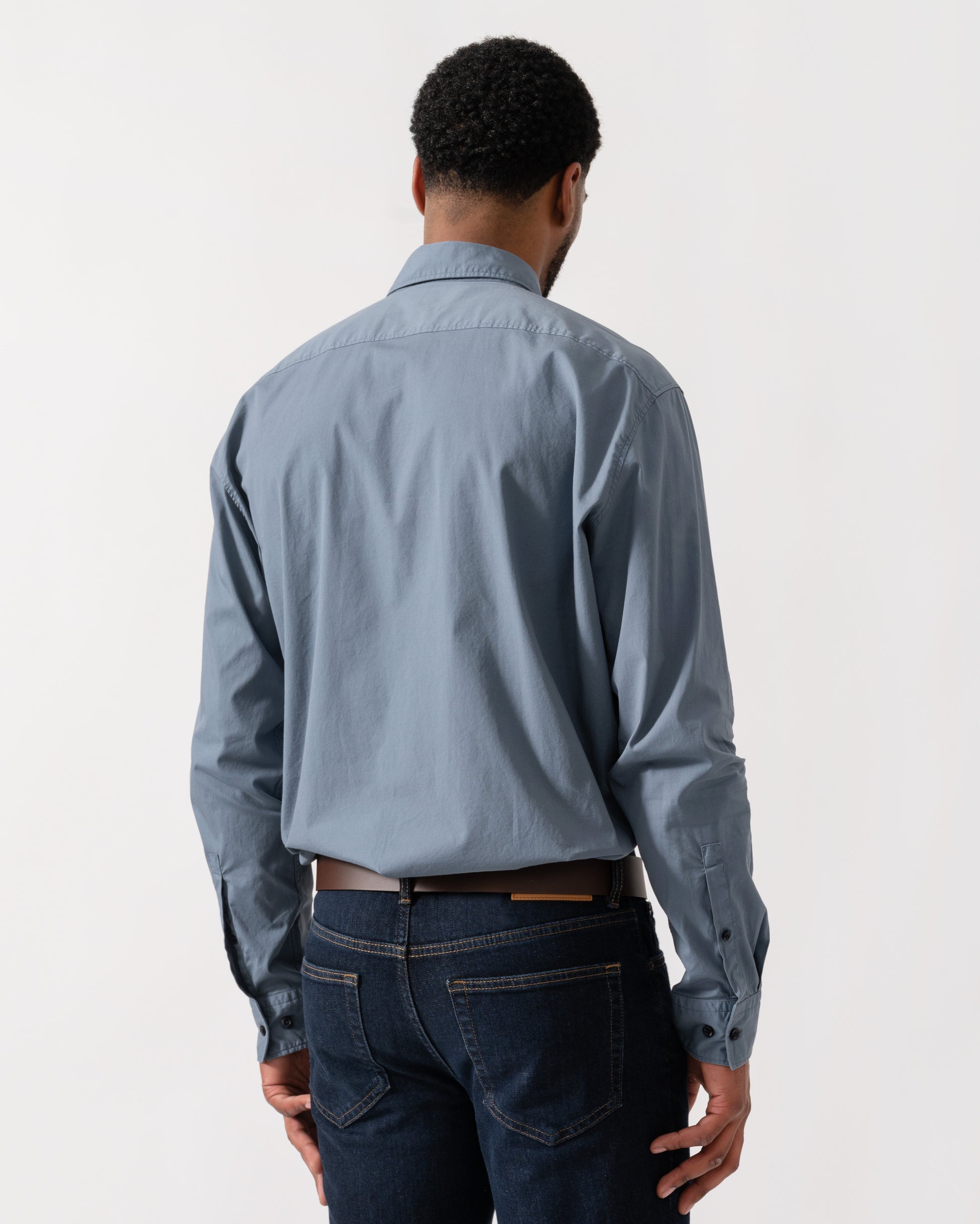 Model wearing HUGO Ermo Slim-Fit Shirt in Stretch-Cotton Canvas in Open Blue 496 - back