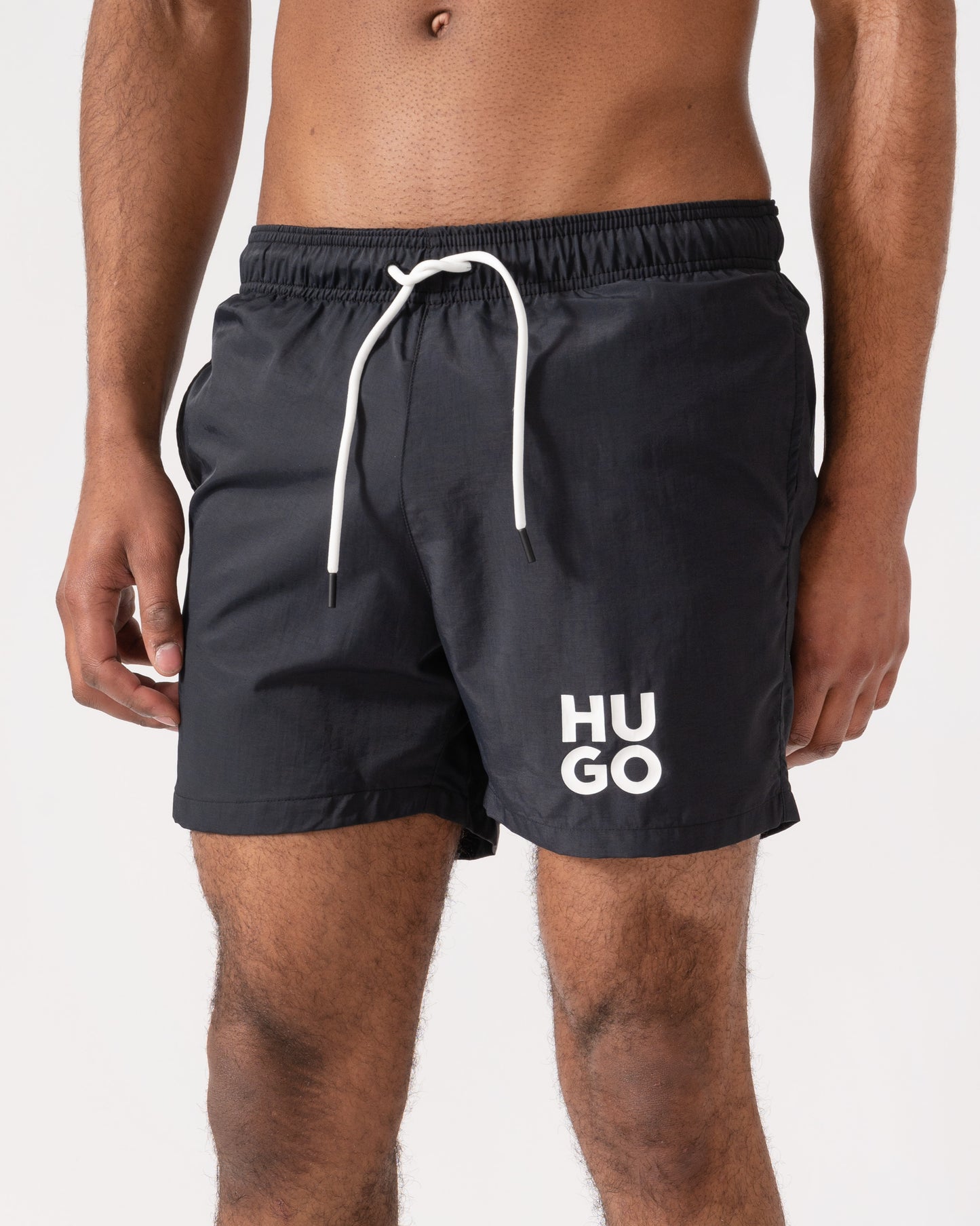 HUGO Mens Paolo Swim Shorts with Stacked Logo Print close up