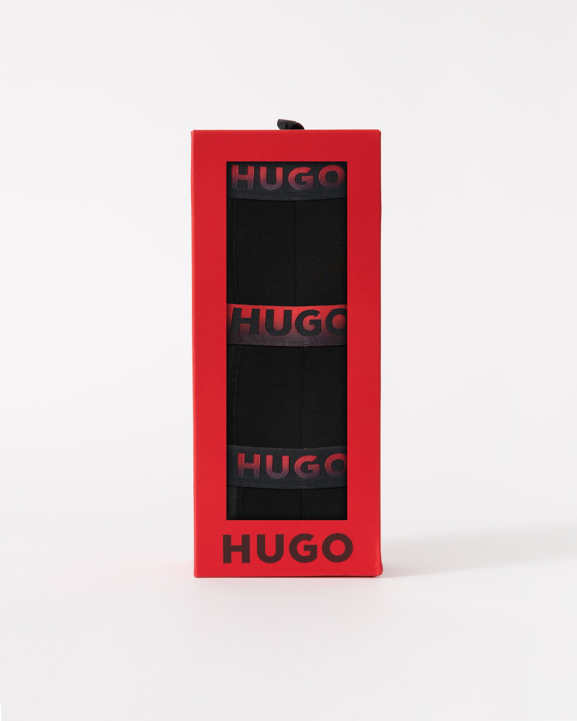 Red HUGO box with black interior on a white background