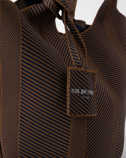 logo detail of Ilse Jacobsen Knitty Womens Knitted Bag in Dark Indigo and Buckthorn Brown