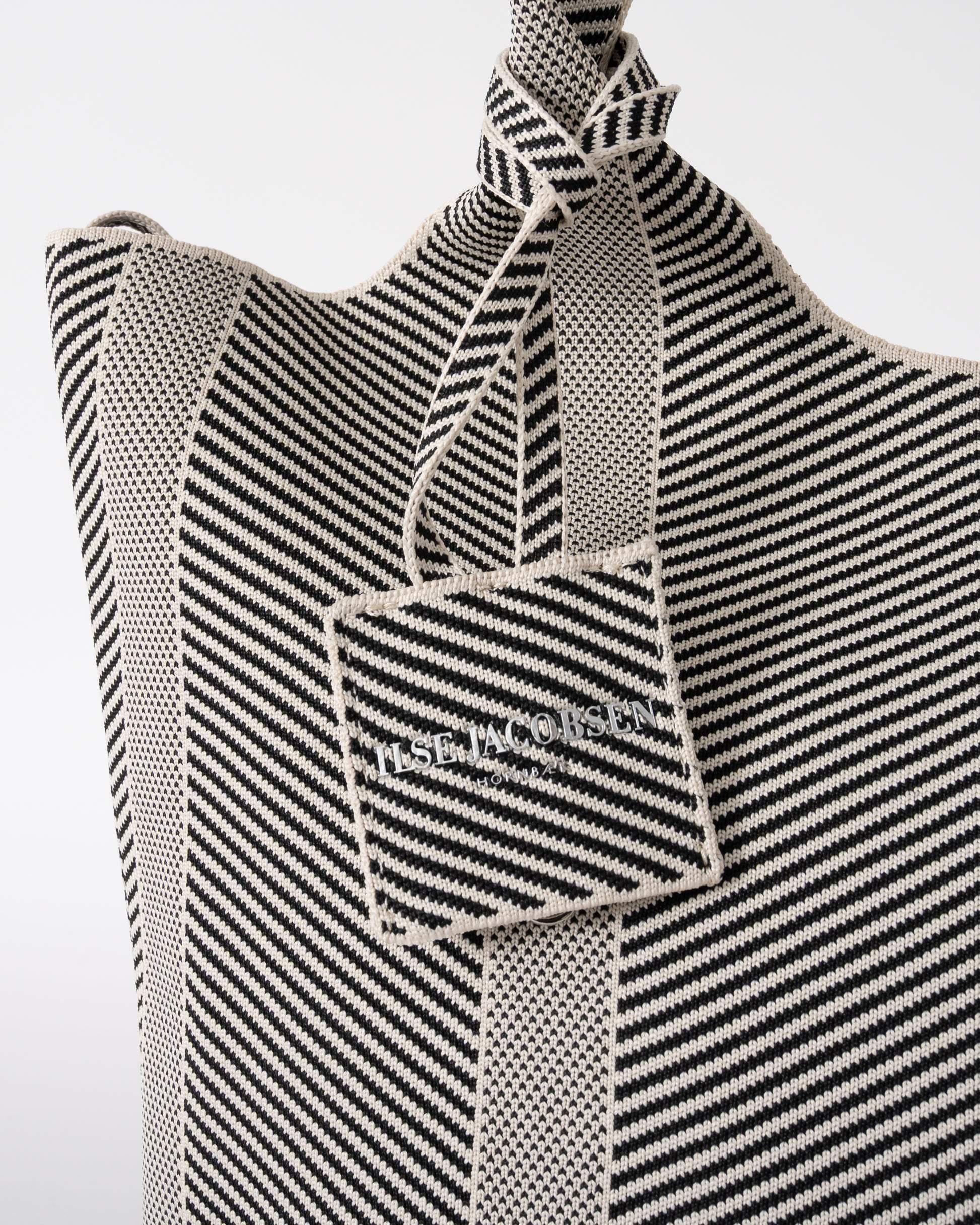 detail of Ilse Jacobsen Knitty Womens Knitted Bag in Milk Creme and  Black