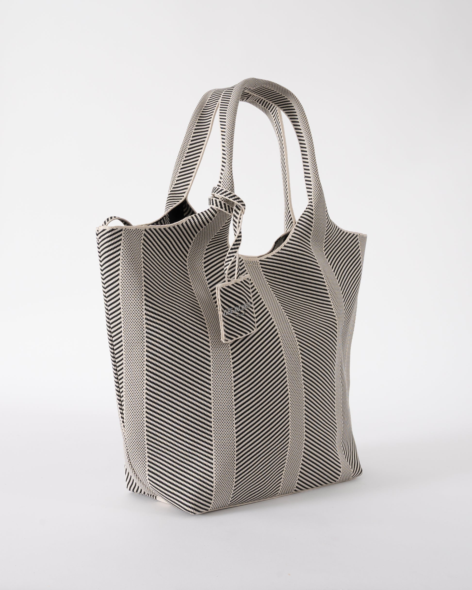 side of Ilse Jacobsen Knitty Womens Knitted Bag in Milk Creme and  Black