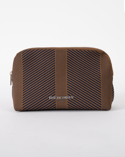 studio shot of Ilse Jacobsen Knitty Womens Knitted Makeup Bag in Dark Indigo and Buckthorn Brown