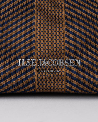 logo detail of Ilse Jacobsen Knitty Womens Knitted Makeup Bag in Dark Indigo and Buckthorn Brown