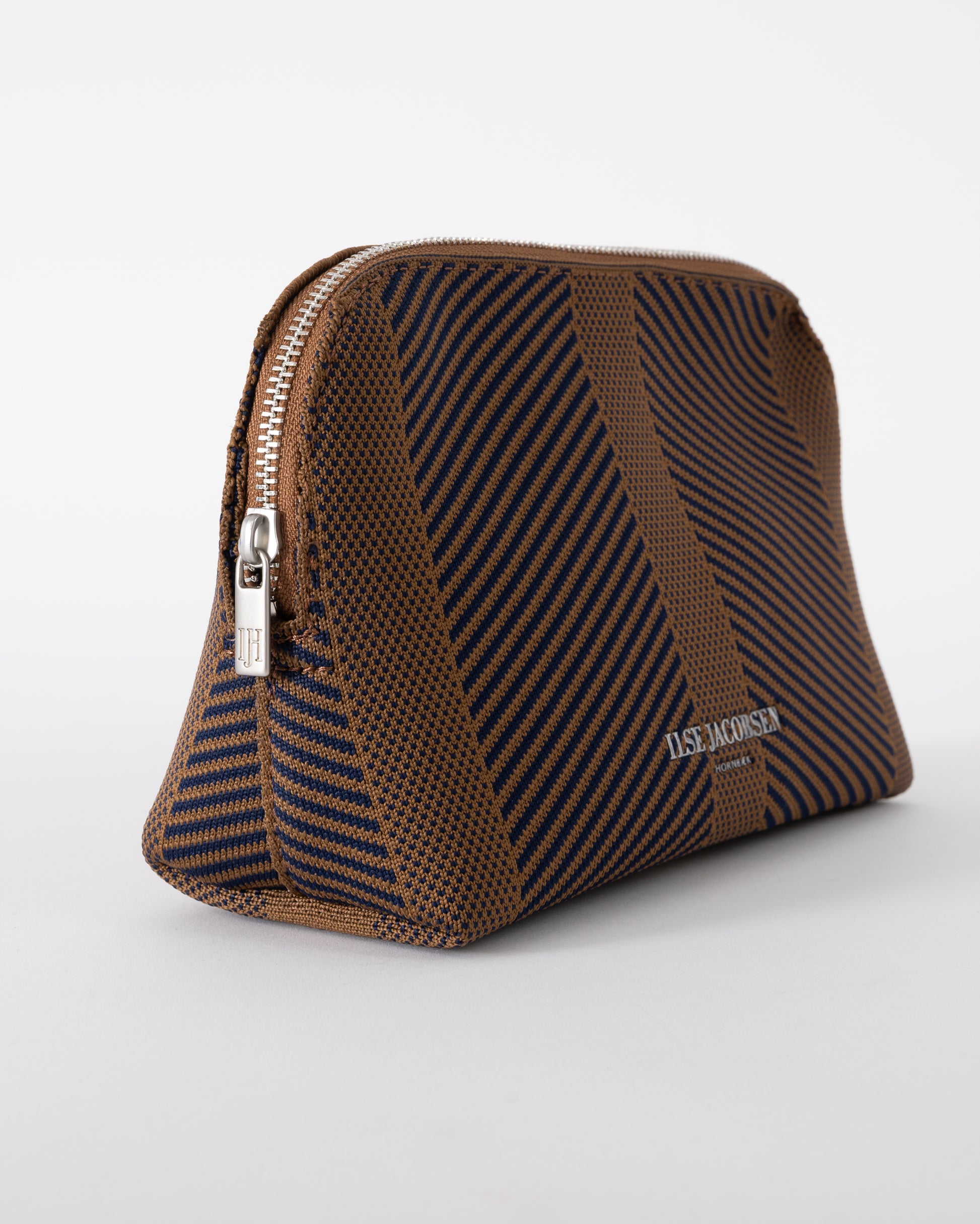 side of Ilse Jacobsen Knitty Womens Knitted Makeup Bag in Dark Indigo and Buckthorn Brown