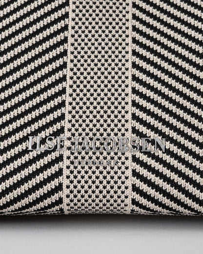 logo detail of Ilse Jacobsen Knitty Womens Knitted Makeup Bag in Milk Creme and Black