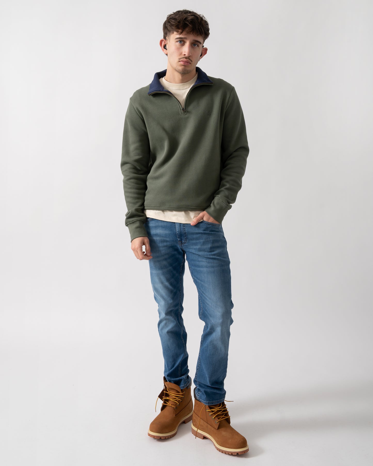 full length shot of a model wearing a Joules Alistair Mens 1/4 Zip Sweatshirt in Khaki Green