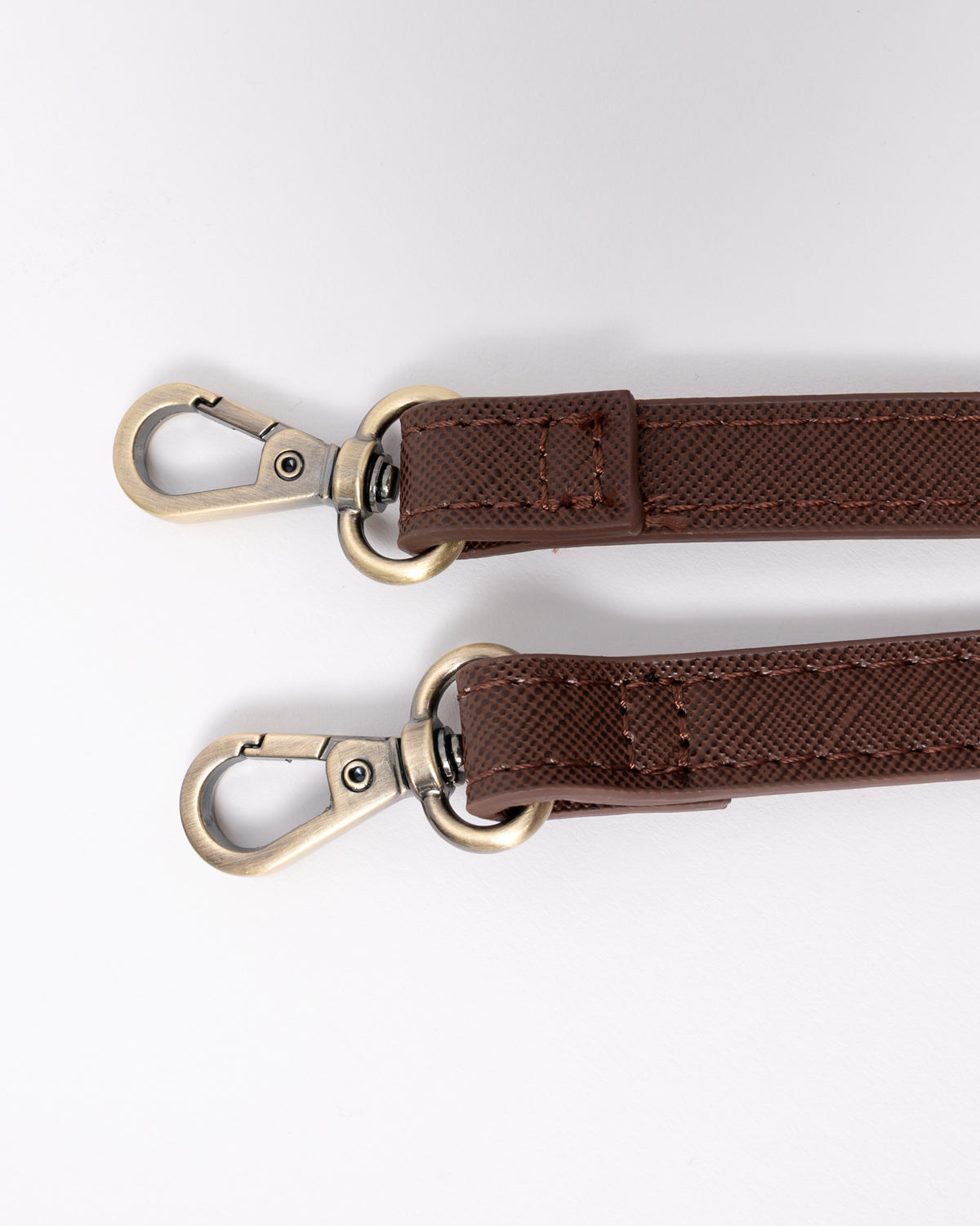 strap detail of a Joules Edie Womens Mini Crossbody Handbag in Navy