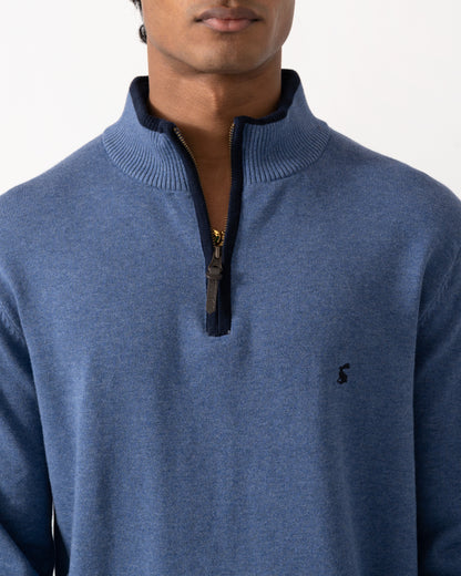 close up Studio photograph of a model wearing a Joules Hillside Mens 1/4 Zip Jumper in Blue