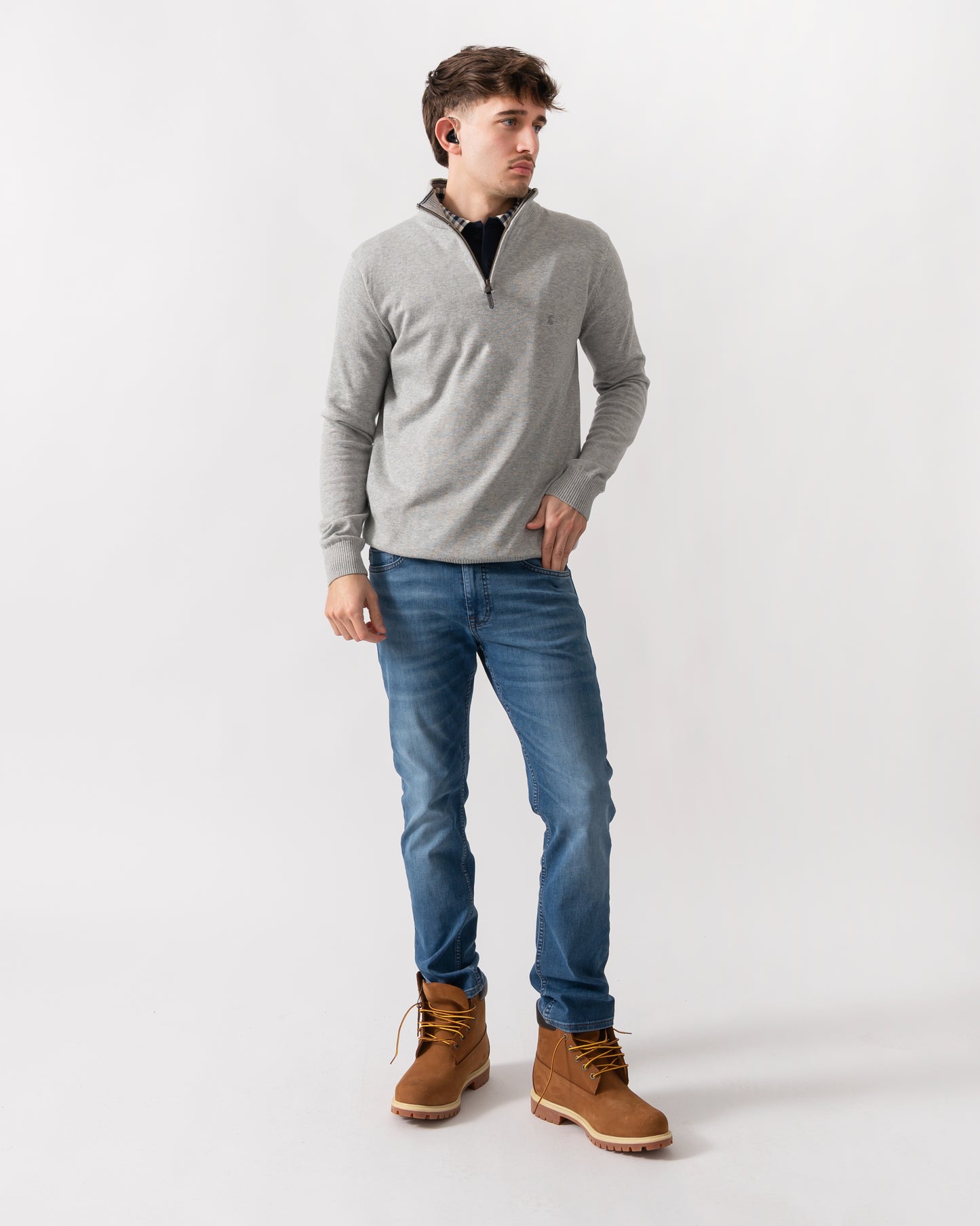 full length shot of a model wearing a Joules Hillside Mens quarter Zip Jumper in Grey