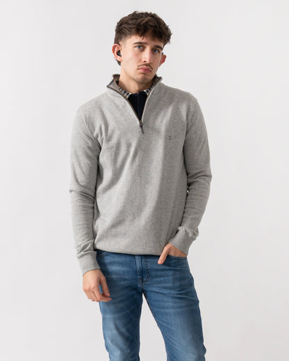 studio shot of a model wearing a Joules Hillside Mens quarter Zip Jumper in Grey