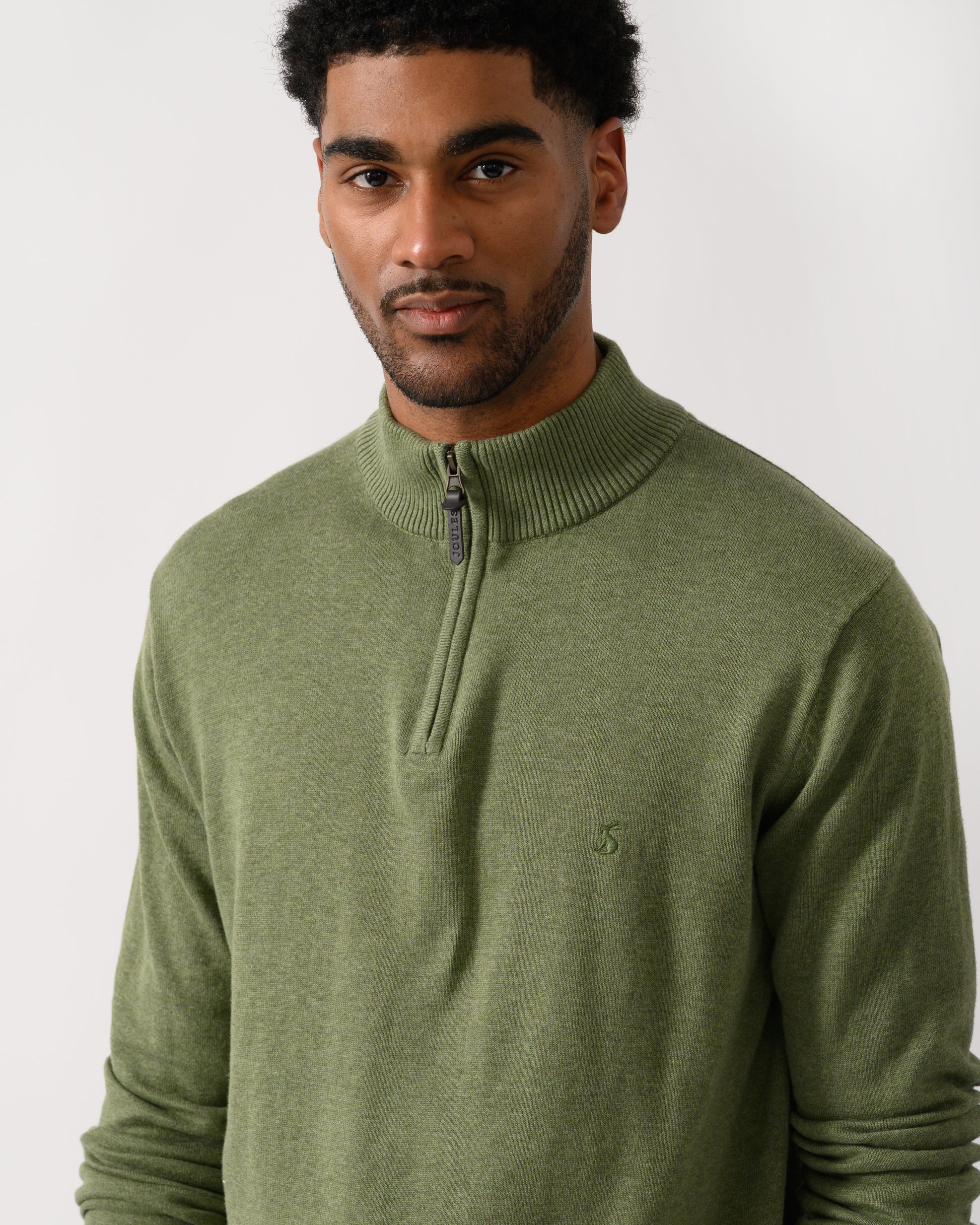 close up of amodel wearing a Joules Hillside Mens 1/4 Zip Jumper in Khaki Green