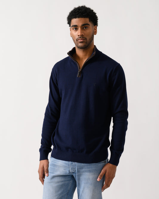 model wearing a Joules Hillside Mens 1/4 Zip Jumper in Navy Blue