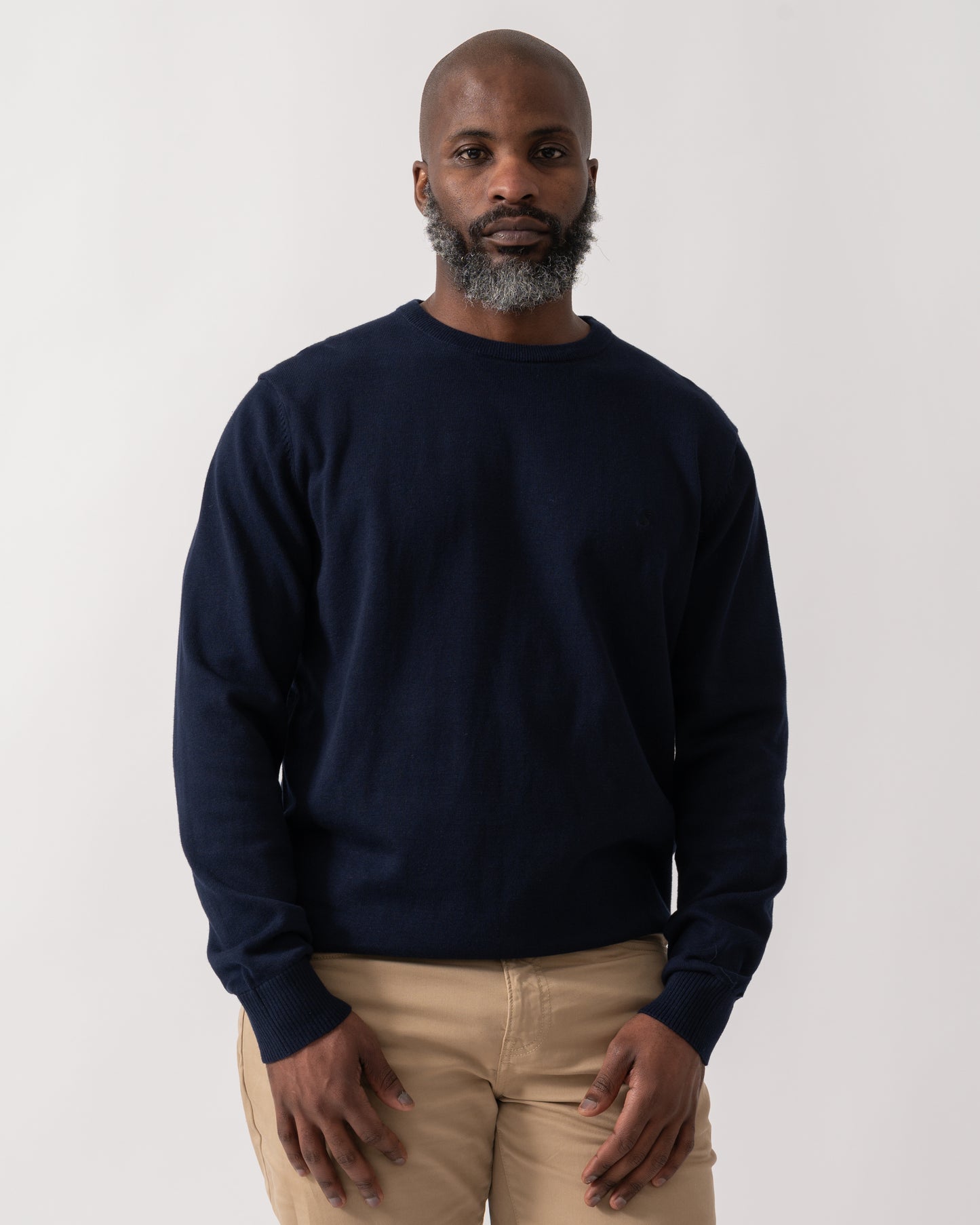 Model wearing a Joules Hillside Mens Crew Neck Jumper in Navy Blue