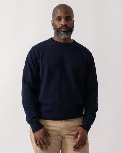 Model wearing a Joules Hillside Mens Crew Neck Jumper in Navy Blue