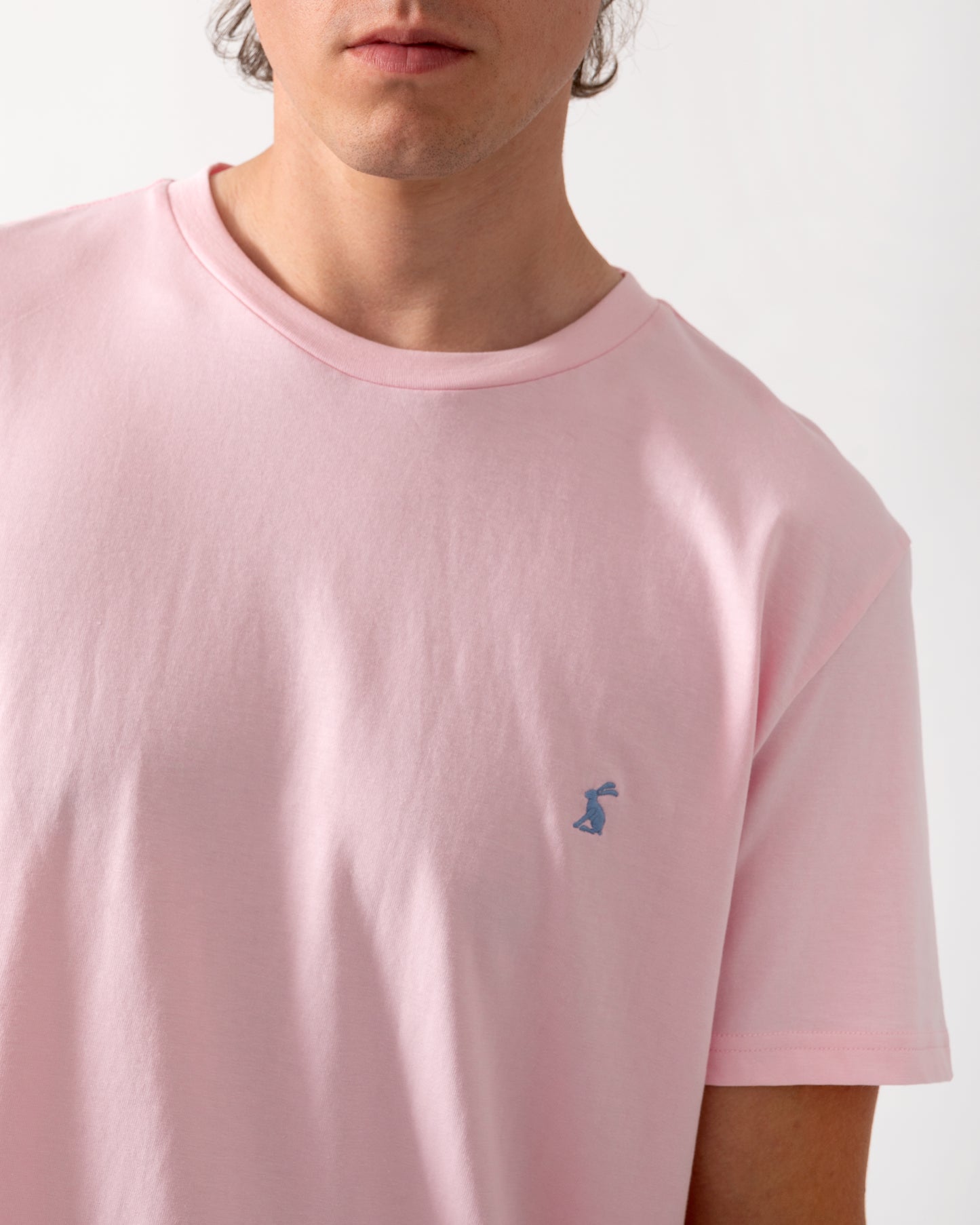 close up shot of a model wearing a Joules Mens Everyday T-Shirt in Pink