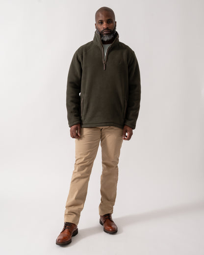 Full length shot of a model wearing a Joules Mens Heritage 1/4 Zip Fleece in Dark Green