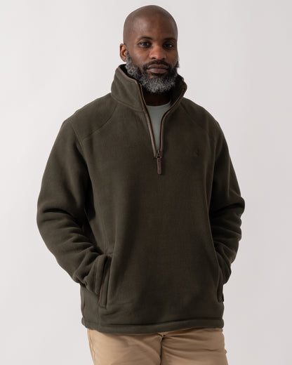 model wearing a Joules Mens Heritage 1/4 Zip Fleece in Dark Green