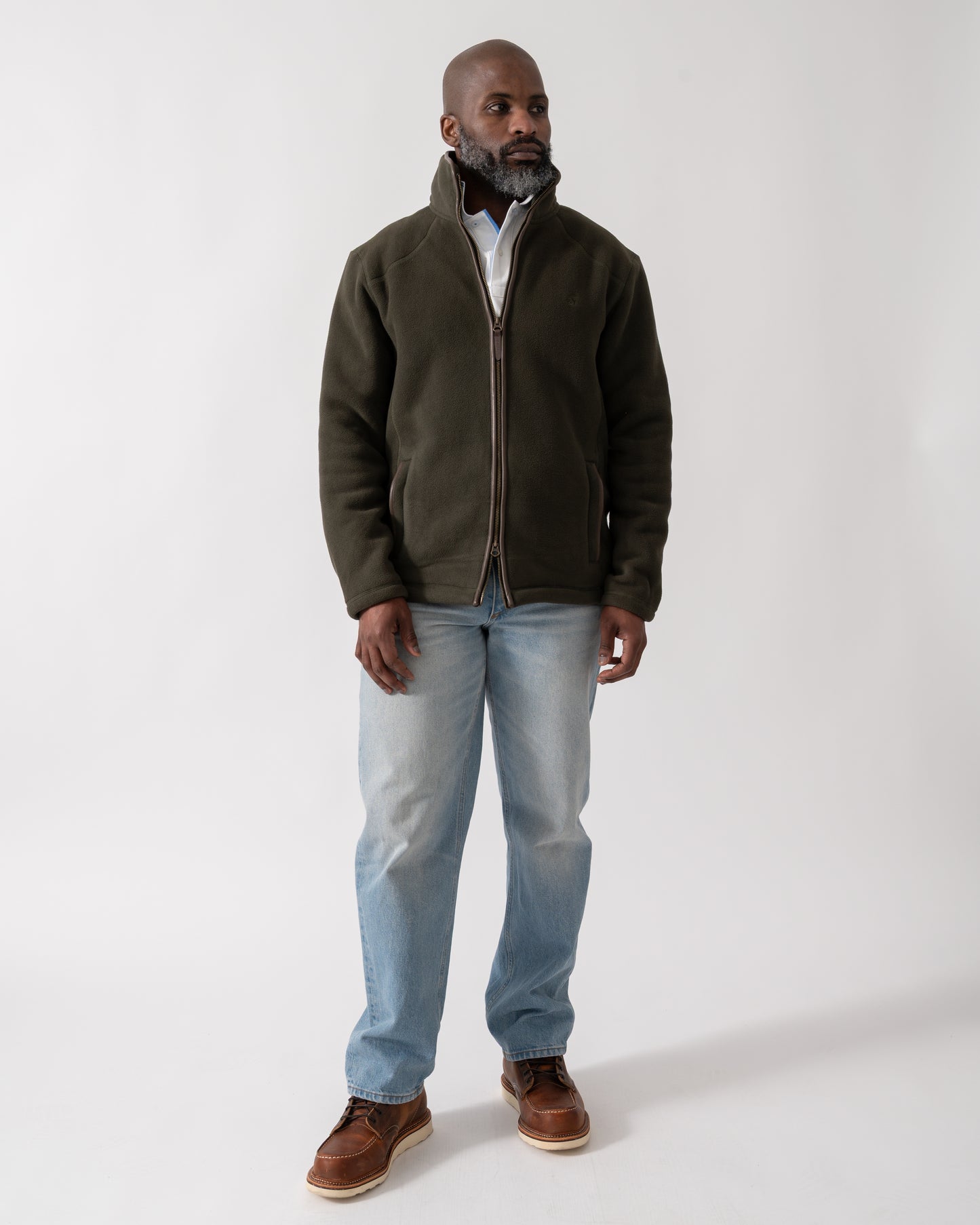 full length shot of a model wearing a Joules Mens Heritage Full Zip Fleece in Dark Green