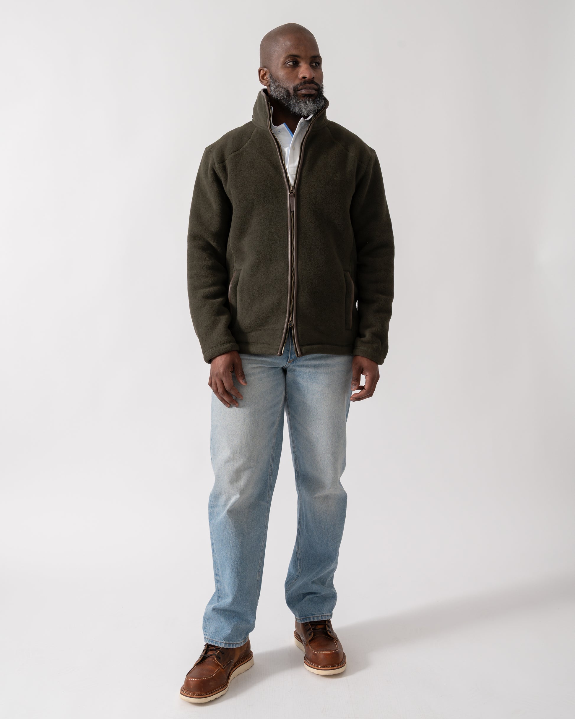 full length shot of a model wearing a Joules Mens Heritage Full Zip Fleece in Dark Green