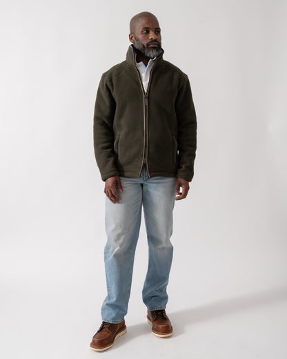 full length shot of a model wearing a Joules Mens Heritage Full Zip Fleece in Dark Green