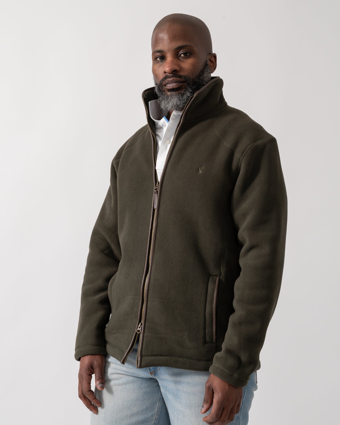 model wearing a Joules Mens Heritage Full Zip Fleece in Dark Green