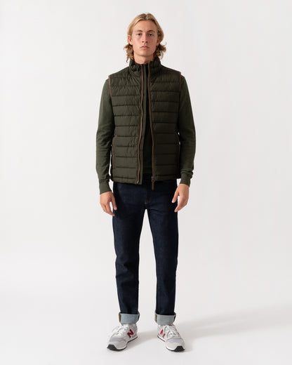 Man wearing the Joules Mens Heritage Padded Gilet - Green