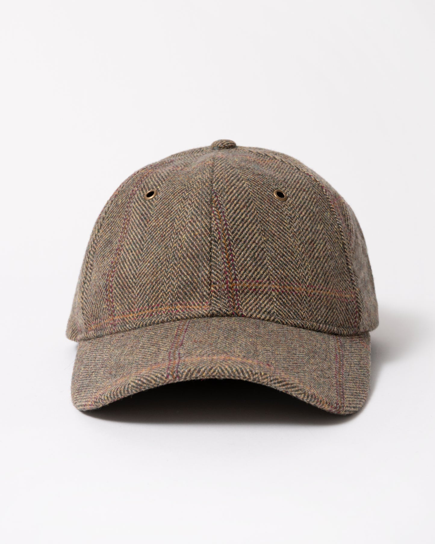 front of a Joules Perry Womens Tweed Baseball Cap in Khaki Tweed