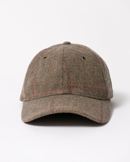 front of a Joules Perry Womens Tweed Baseball Cap in Khaki Tweed