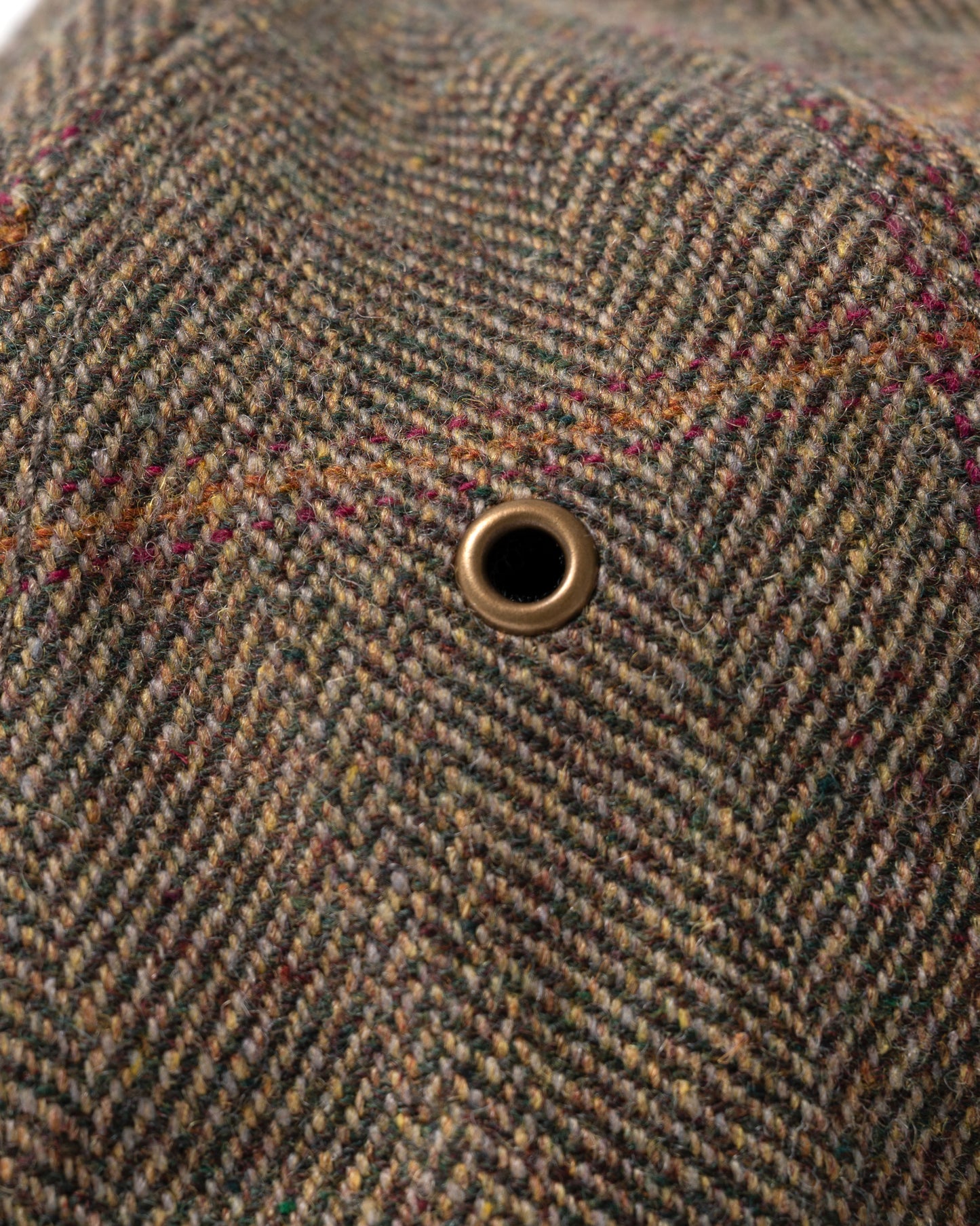 vent eyelet detail of Joules Perry Womens Tweed Baseball Cap in Khaki Tweed