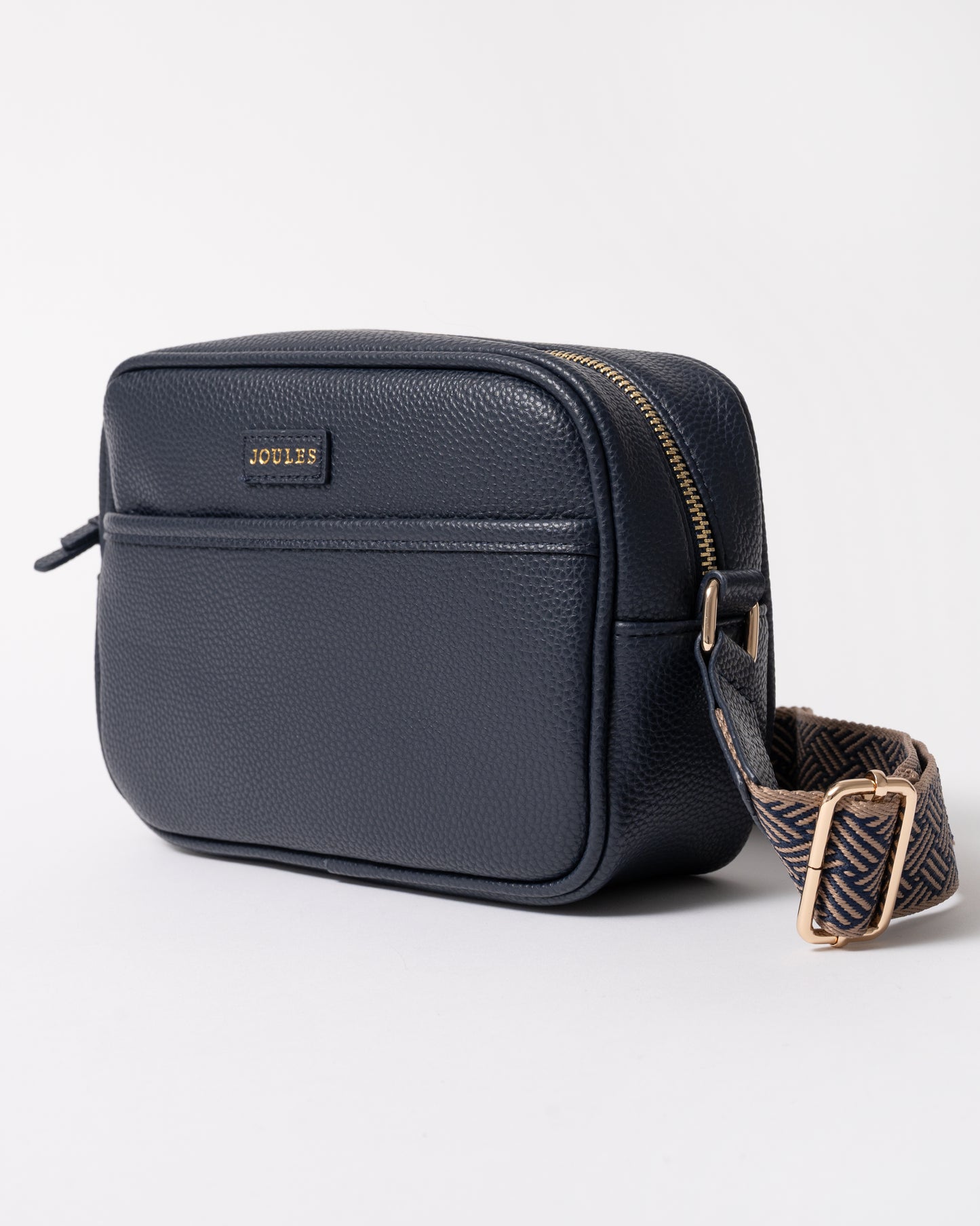 side of a Joules Trent Womens Faux Leather Crossbody Bag in Navy