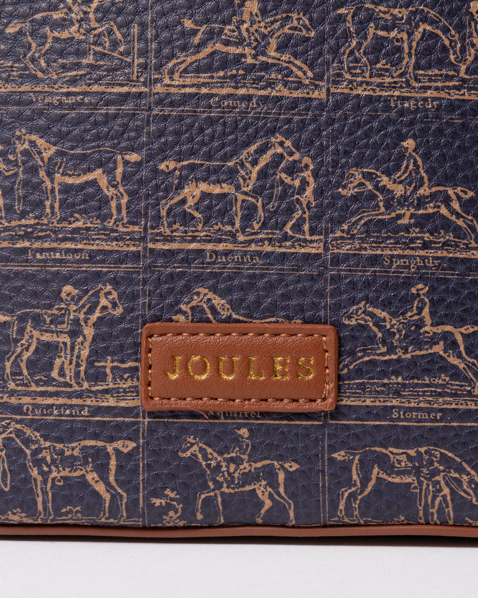 logo detail of a Joules Womens Bucket Bag in Navy Horse