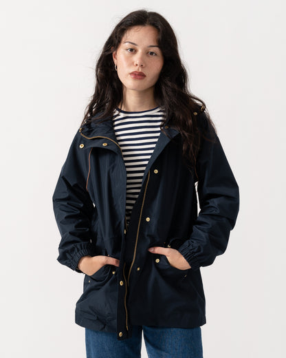 Woman wearing the Joules Everdry Womens Packable Raincoat - Navy