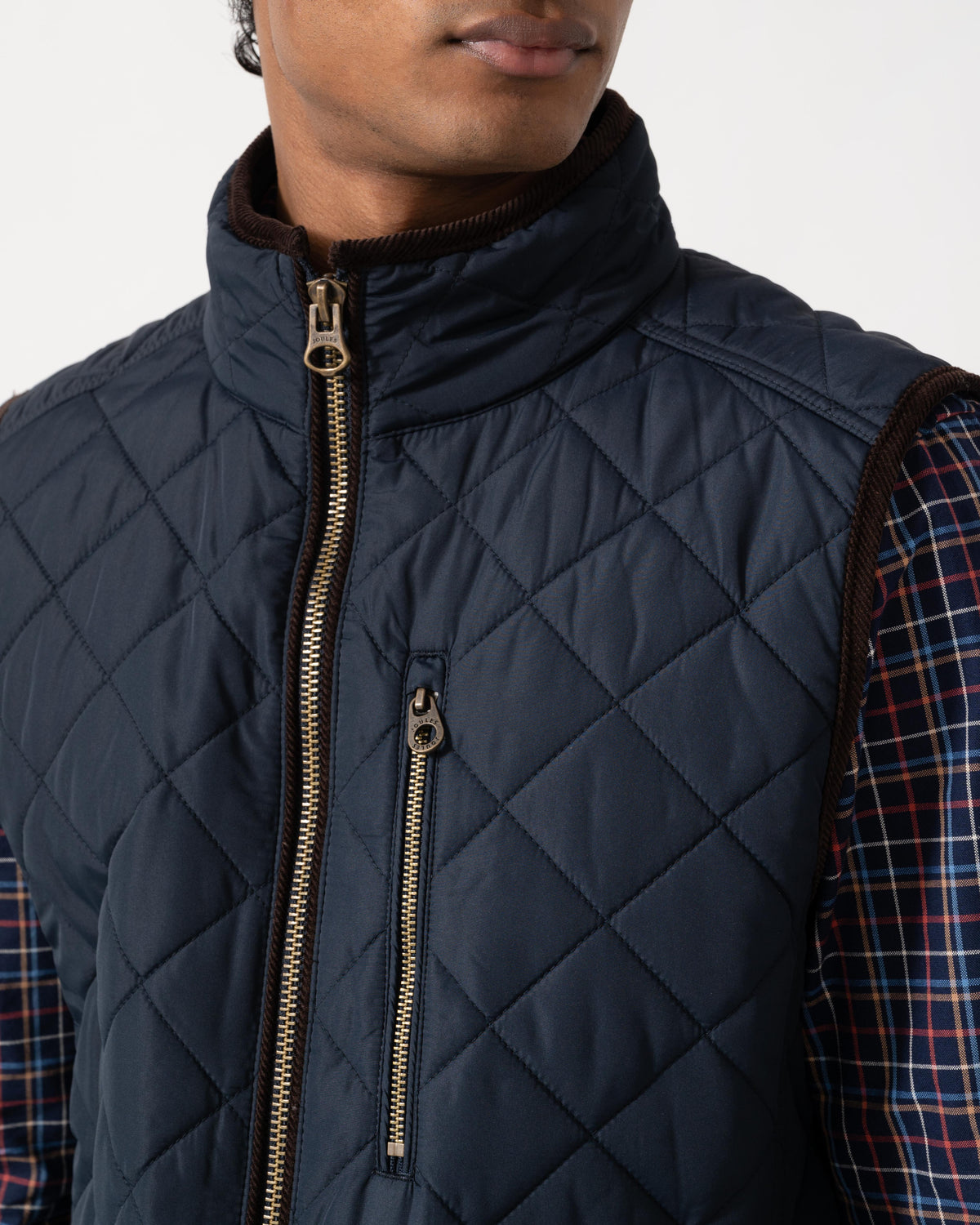 Close up of the Joules Maynard Mens Quilted Gilet - Navy